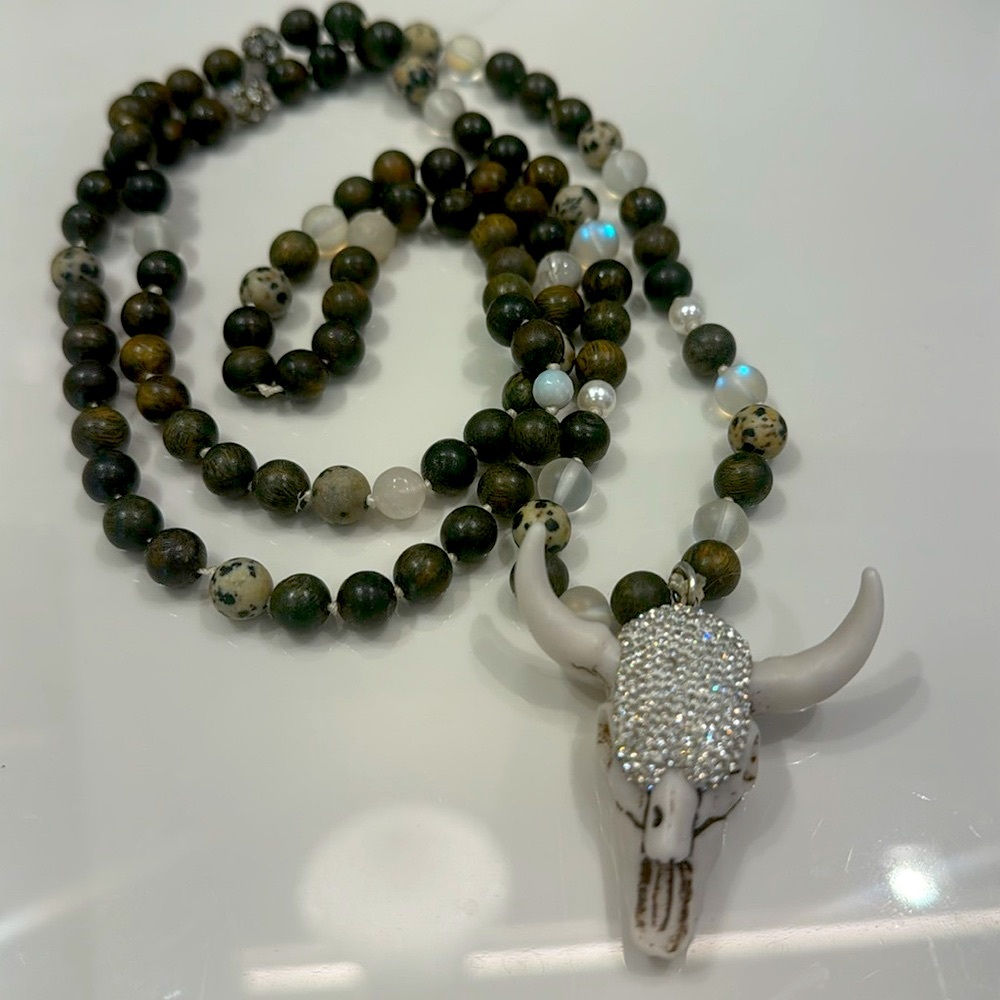Black and white beaded ox head pendant necklace 21”